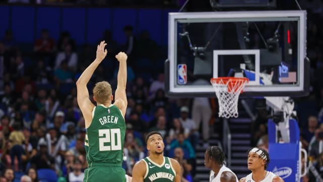 Milwaukee Bucks guard AJ Green (20) shoots a three point basket